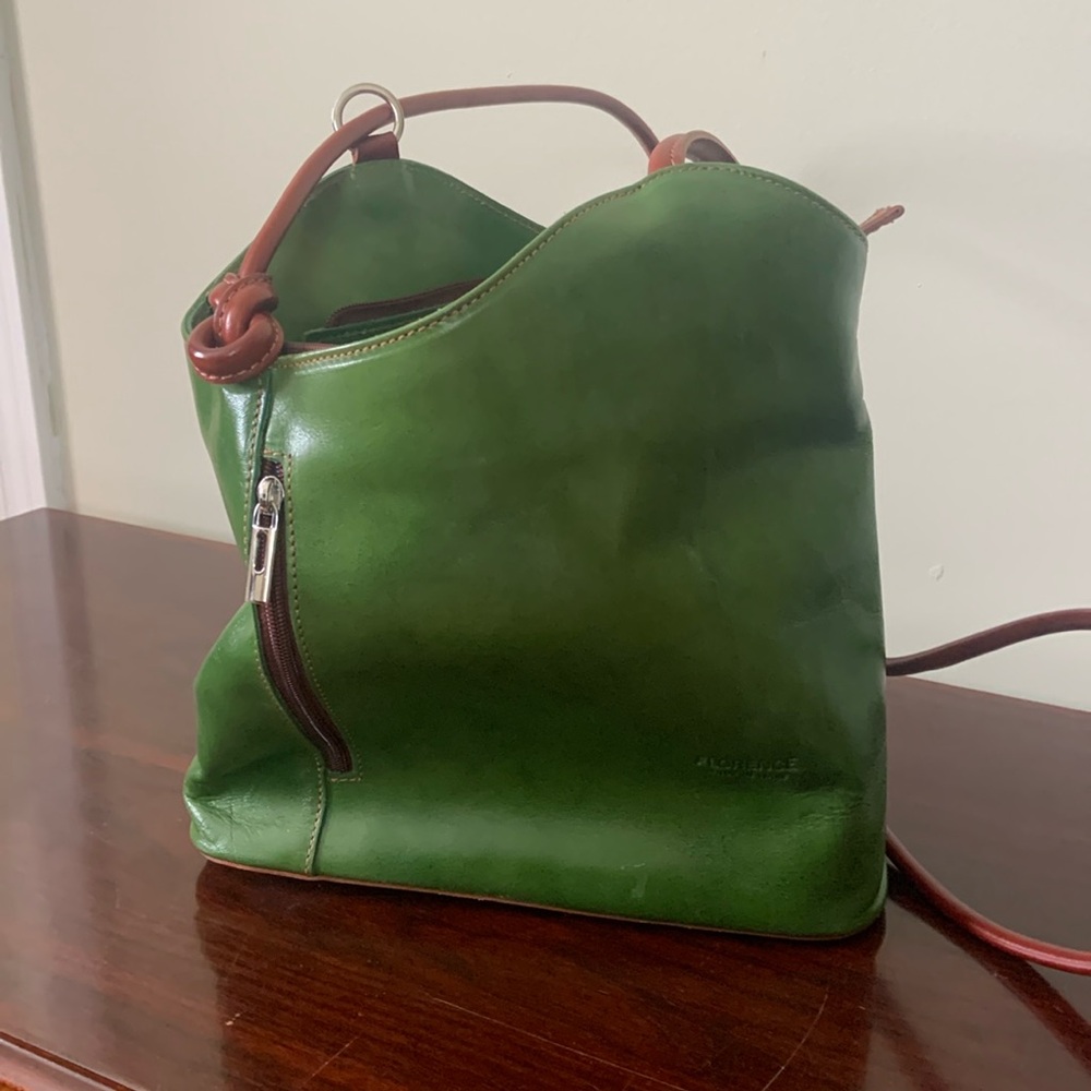 Italian made green leather purse. Convertible straps can be worn as backpack.